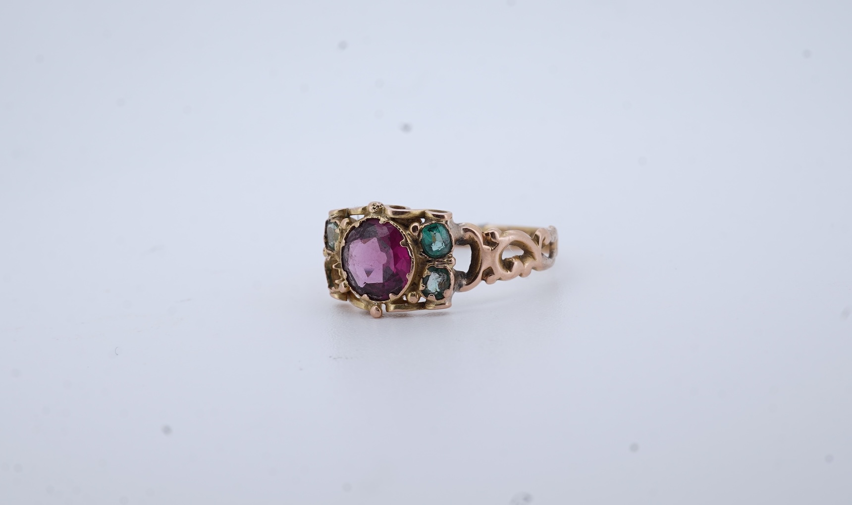 A Victorian garnet and paste ring, circa 1857